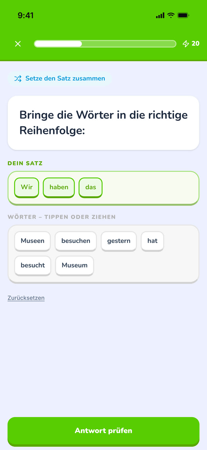 Sentence tiles on phone: The tile builder mid-answer: a sentence being assembled word by word. Interface in German, invented demo data.
